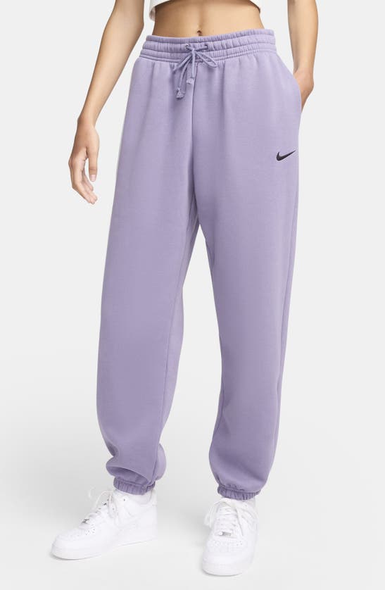 Shop Nike Phoenix Oversize Fleece Sweatpants In Daybreak/ Black