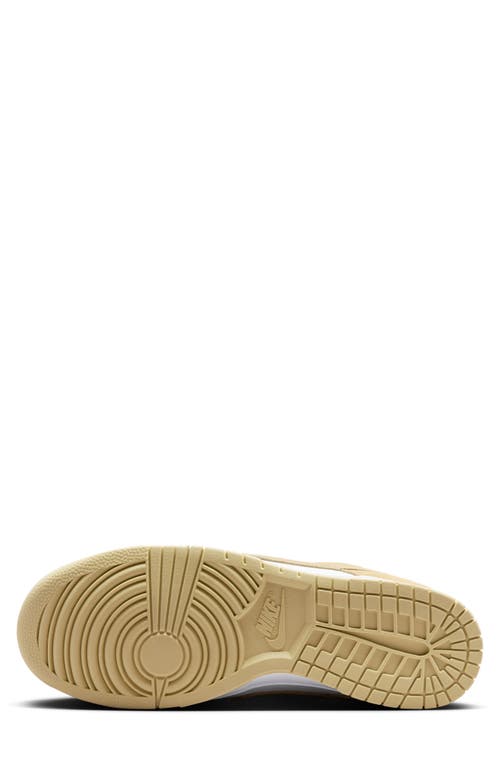 Shop Nike Dunk Low Se Basketball Sneaker In White/tm Gold/white