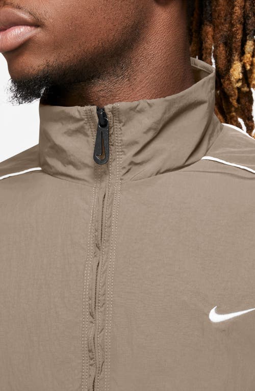 Shop Nike Solo Swoosh Track Jacket In Khaki/white