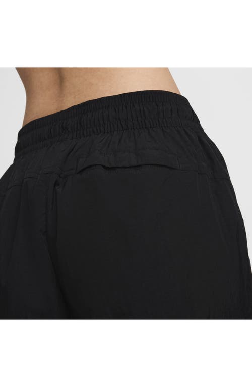 Shop Nike Sportswear Repel Zip Hem Pants In Black/white