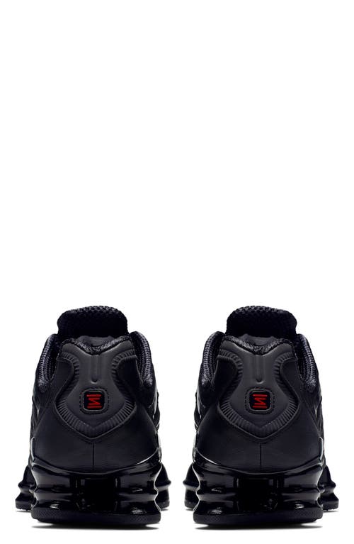 Shop Nike Shox Tl Sneaker In Black/metallic/max Orange