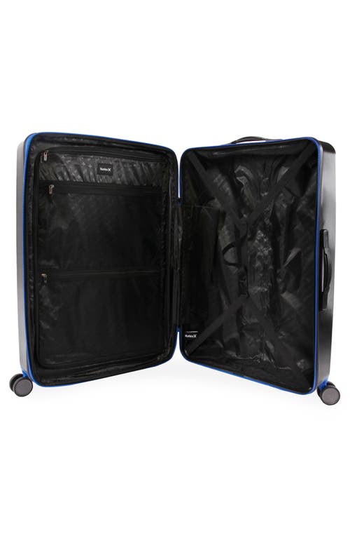 Shop Hurley Wave 29" Hardshell Spinner Suitcase In Black/blue