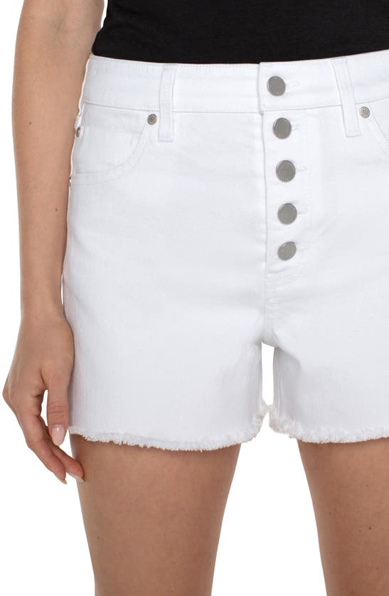 Shop Liverpool Los Angeles Christine Exposed Button Fly High Waist Cutoff Denim Shorts In Bright White
