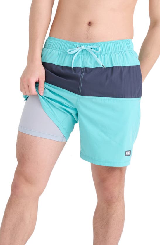 Shop Saxx Oh Buoy Colorblock Volley Swim Trunks In Turquiose/ India Ink