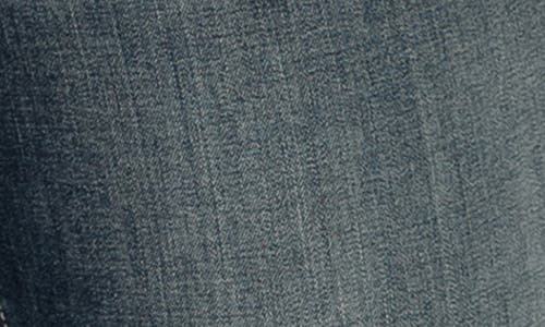 Shop Silver Jeans Co. Girlfriend Distressed Skinny Jeans In Indigo