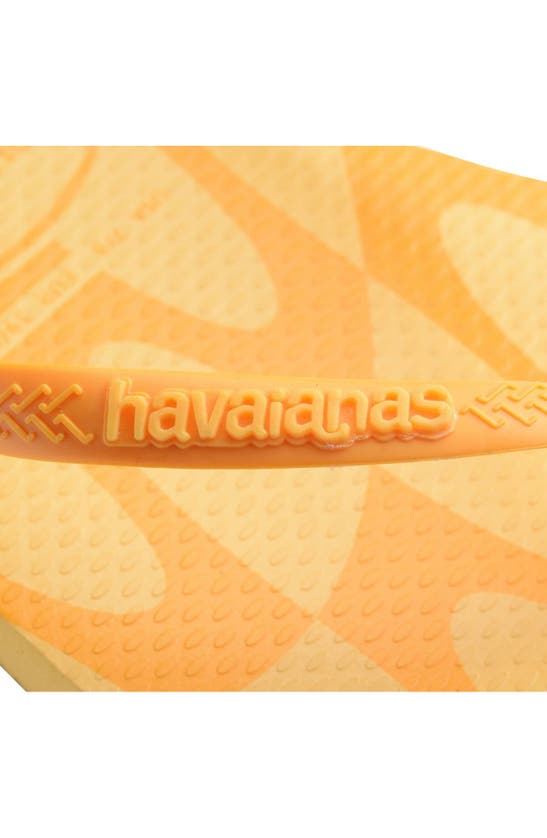 Shop Havaianas Distorted Wave Flip Flop In Caja Yellow