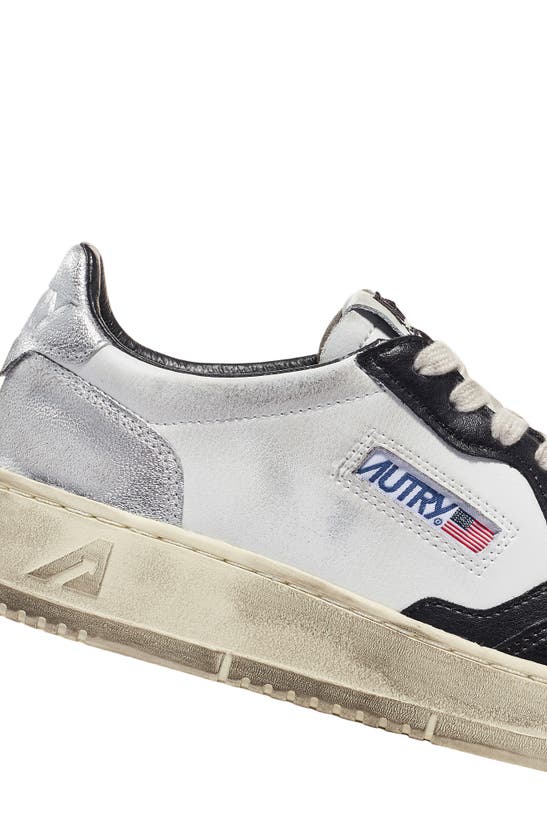 Shop Autry Medalist Super Low Sneaker In White/ Black/ Silver