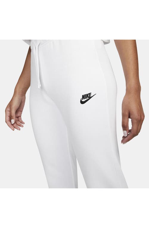 Shop Nike Sportswear Club Fleece Mid-rise Slim Joggers In White/black