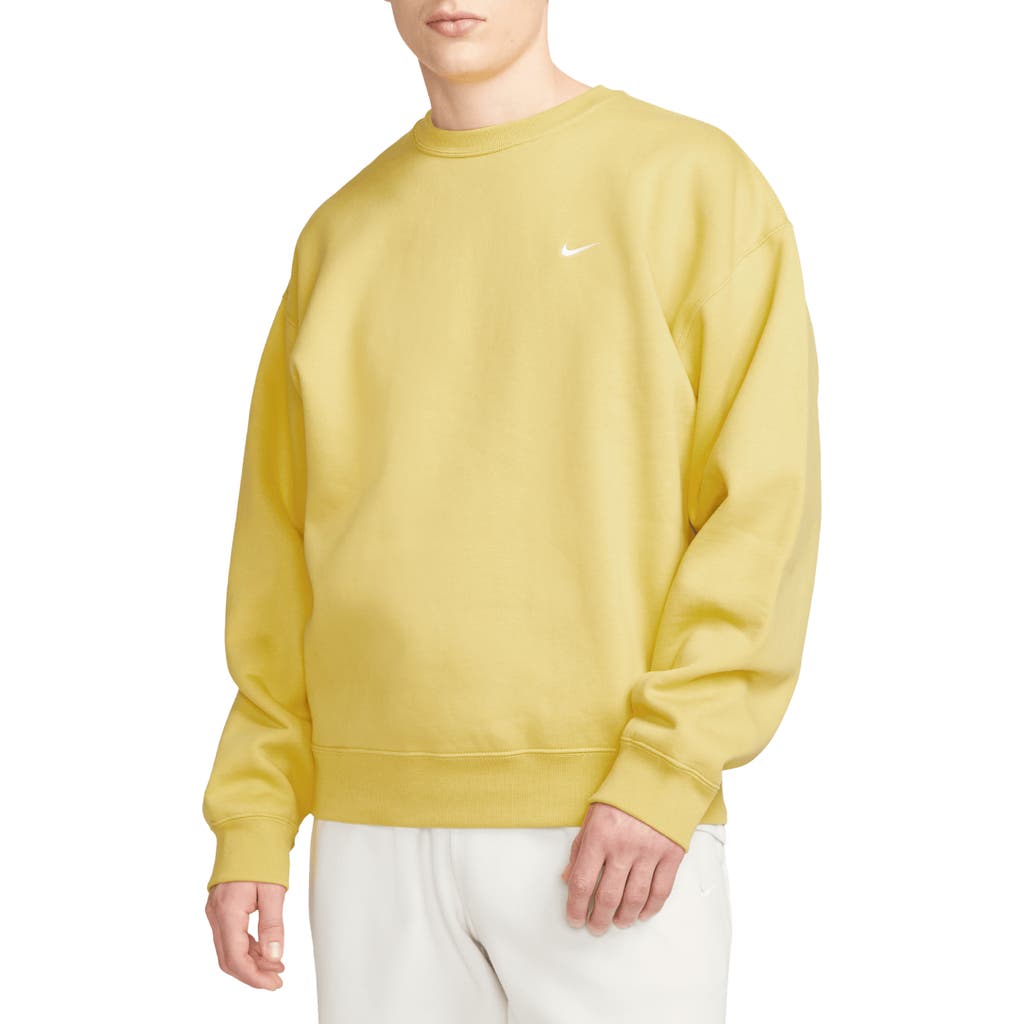 Nike Solo Swoosh Oversize Crewneck Sweatshirt In Saturn Gold/white