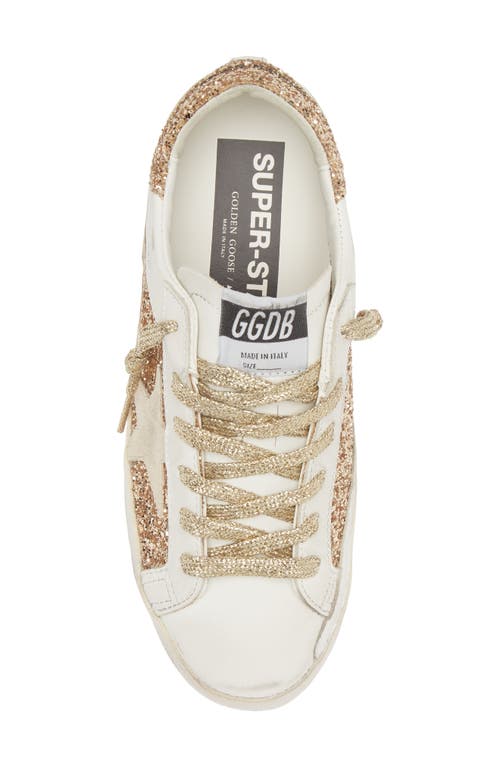 Shop Golden Goose Super-star Low Top Sneaker In Gold/white