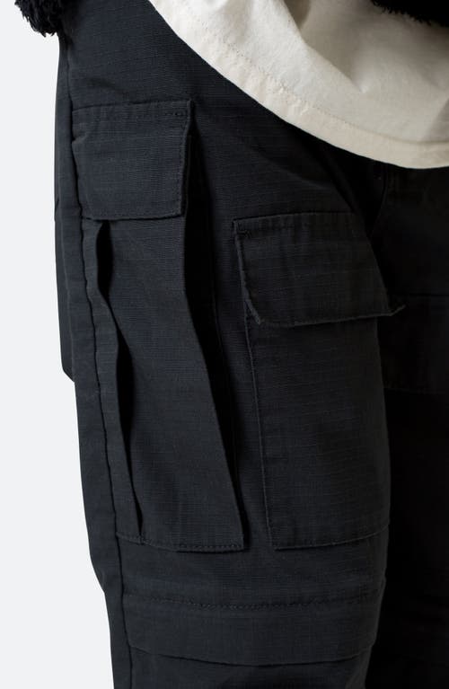 Shop Mnml Ultra Baggy Cotton Cargo Pants In Black