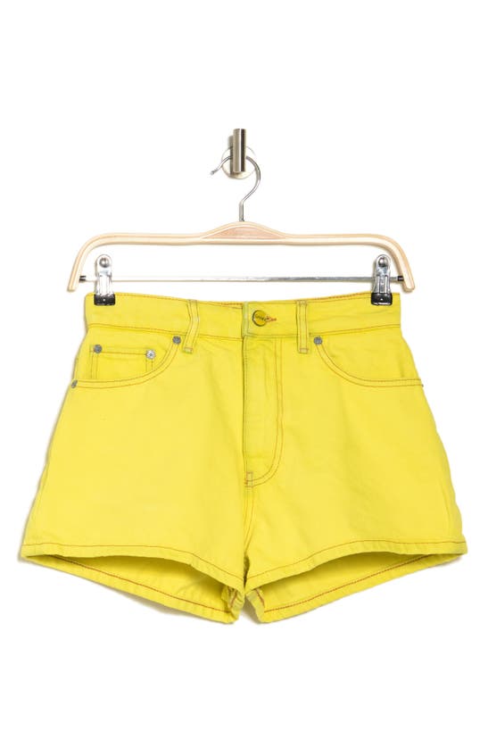 Shop Ganni Overdyed Bleach High Waist Denim Shorts In Blazing Yellow