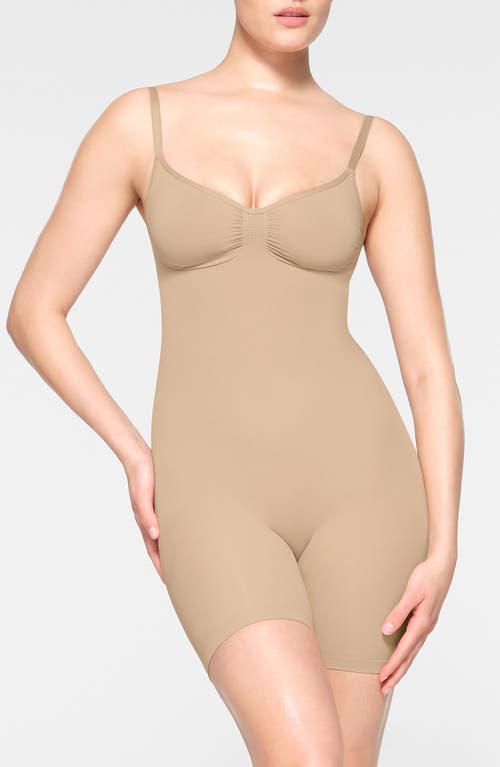 Shop Skims Seamless Sculpt Low Back Mid Thigh Bodysuit In Clay