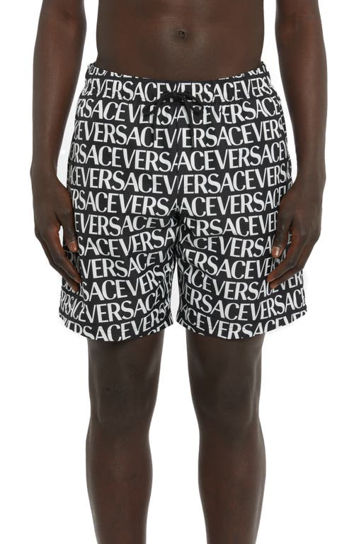 Versace Logo Print Swim Trunks In Black/white