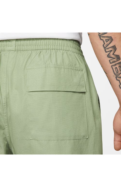 Shop Nike Club Woven Cargo Pants In Oil Green/white