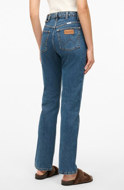 Shop Staud + Wrangler The Everyday Jeans In Mid Blue