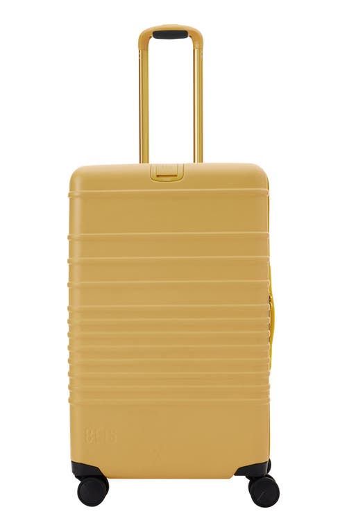The Medium 26-Inch Check-In Roller Bag in Honey