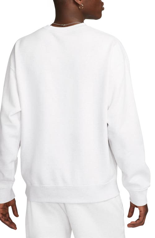 Shop Nike Solo Swoosh Oversize Crewneck Sweatshirt In Birch Heather/white