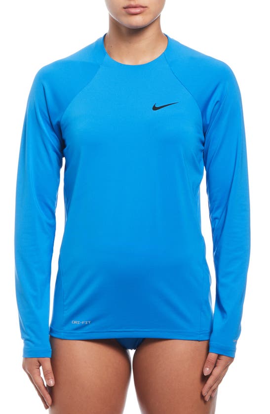 Shop Nike Essential Dri-fit Long Sleeve Hydroguard Top In Photo Blue
