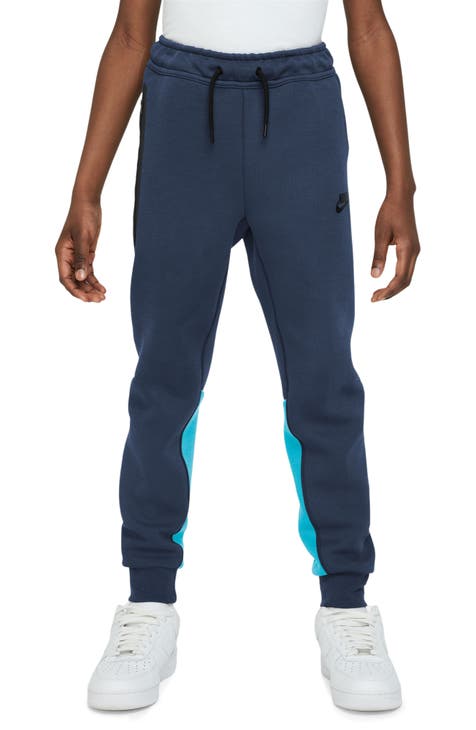 Nike Tapered Logo-Print Nylon Track Pants - Luxed
