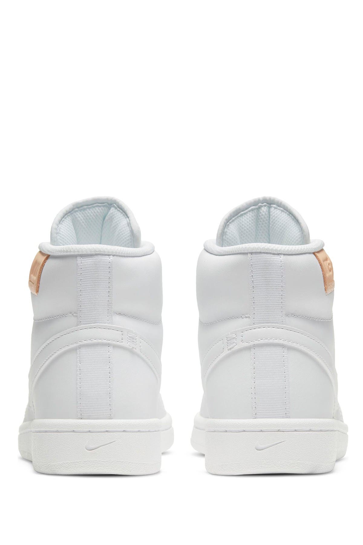 pink and white nike football cleats