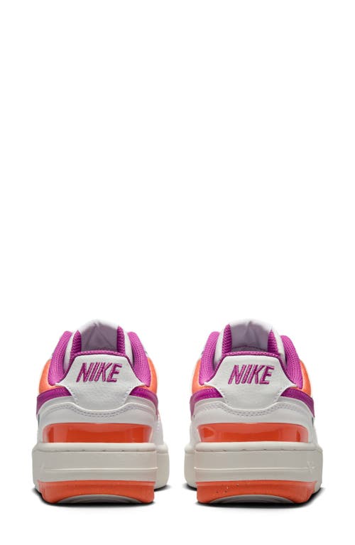 Shop Nike Gamma Force Sneaker In White/fuchsia/mango