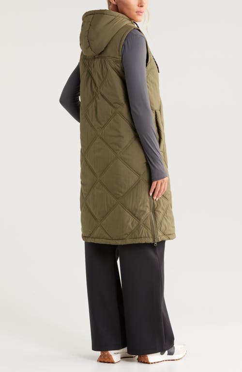 Shop Zella Long Hooded Puffer Vest In Olive Night