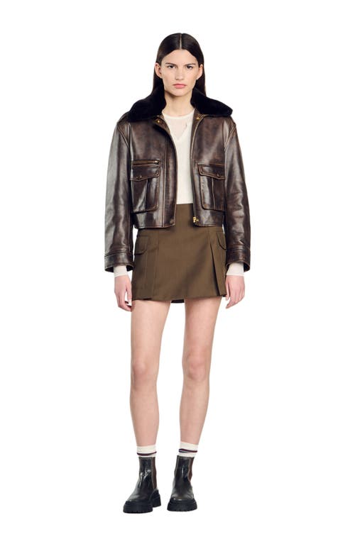 Shop Sandro Short Skirt With Pockets In Olive Green