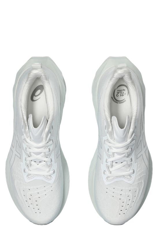Shop Asics Novablast 4 Running Shoe In White/ Pale Mint