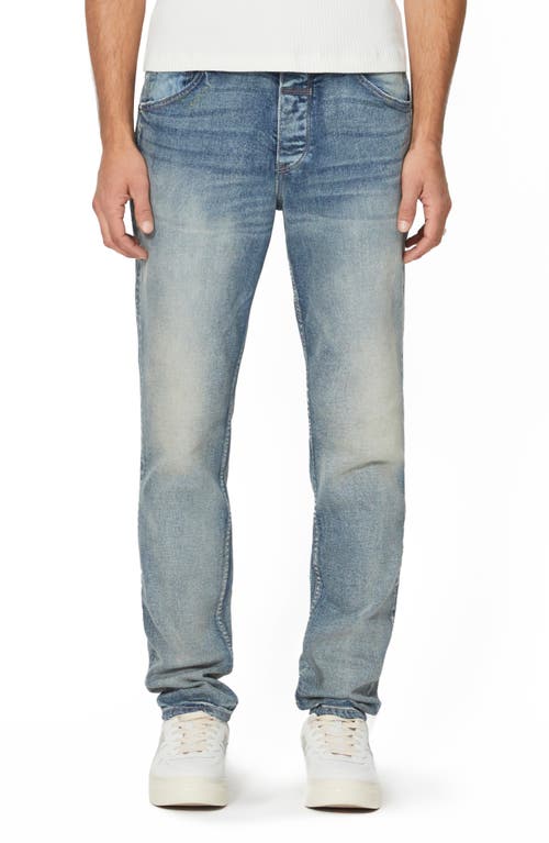 Distressed Tapered Jeans in Maurizio