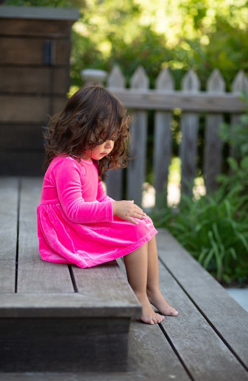 Worthy Threads Stretch Velvet Long Sleeve Bubble Romper In Hot Pink