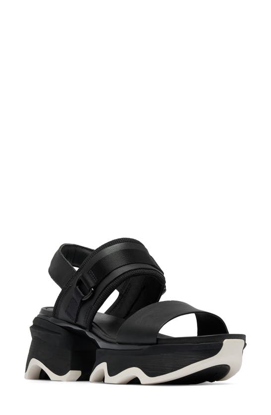 Shop Sorel Kinetic Impact Slingback Sandal In Black/ Black
