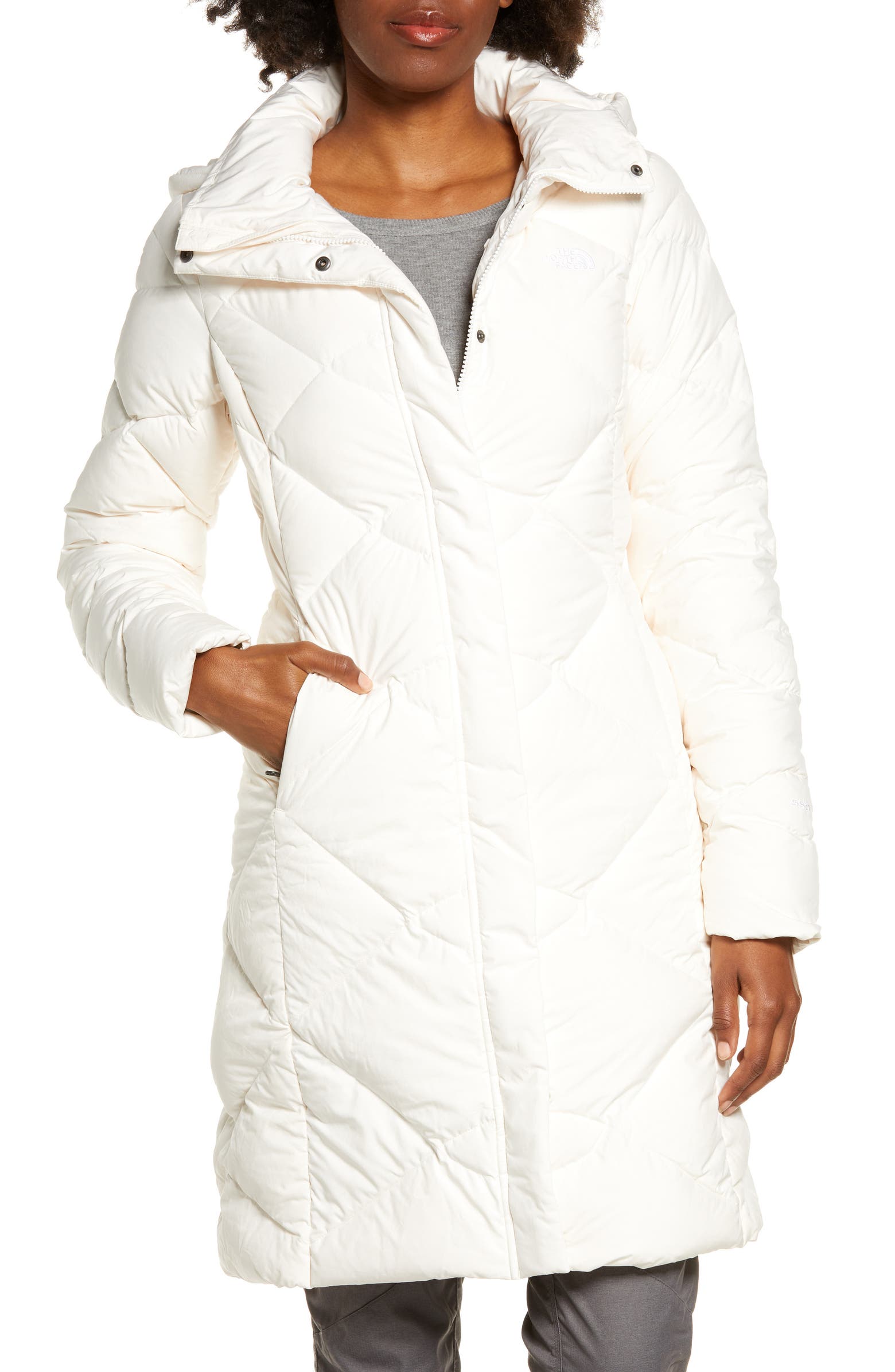 Long white puffer coat from The North Face