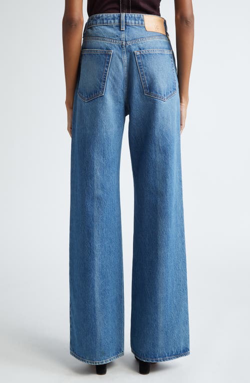 Shop Ulla Johnson The Willow High Waist Wide Leg Jeans In Danube Medium Indigo Wash