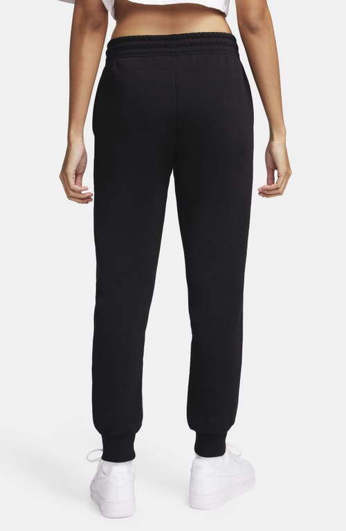 Shop Nike Sportswear Phoenix Fleece Mid Rise Joggers In Black/sail