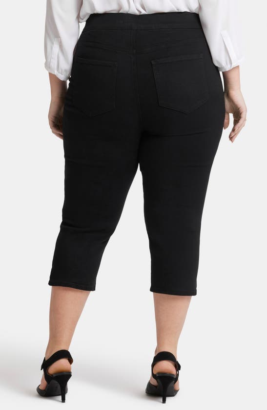 Shop Nydj Dakota Side Slit Pull-on Capri Jeans In Overdye Black