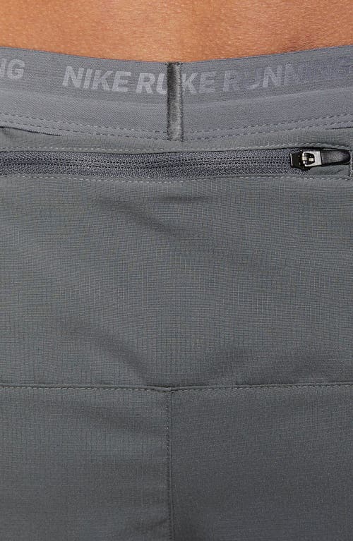 Nike Dri-fit Stride 2-in-1 Running Shorts In Smoke Grey/silver