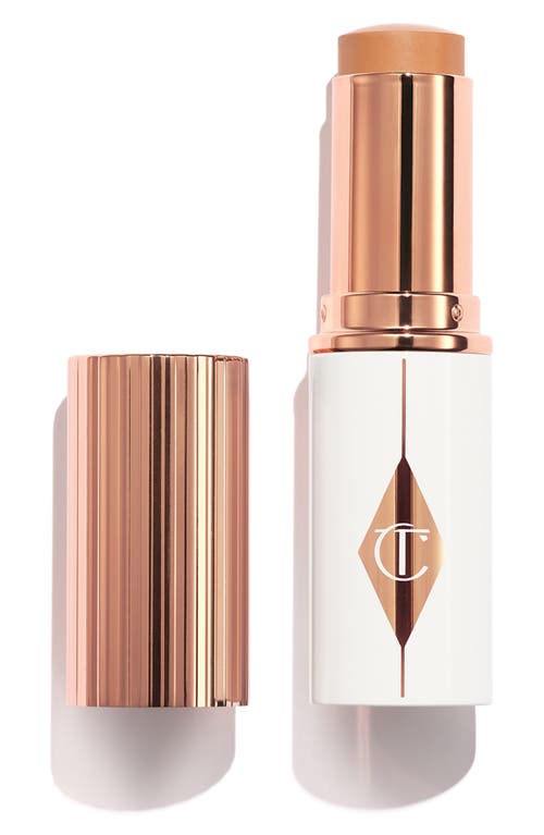 Shop Charlotte Tilbury Unreal Skin Sheer Glow Tint Hydrating Foundation Stick In 8 Medium