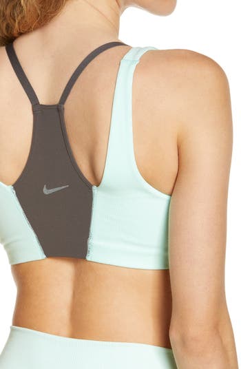 Nike Training Nike Yoga Indy light support crochet sports bra in blue -  ShopStyle