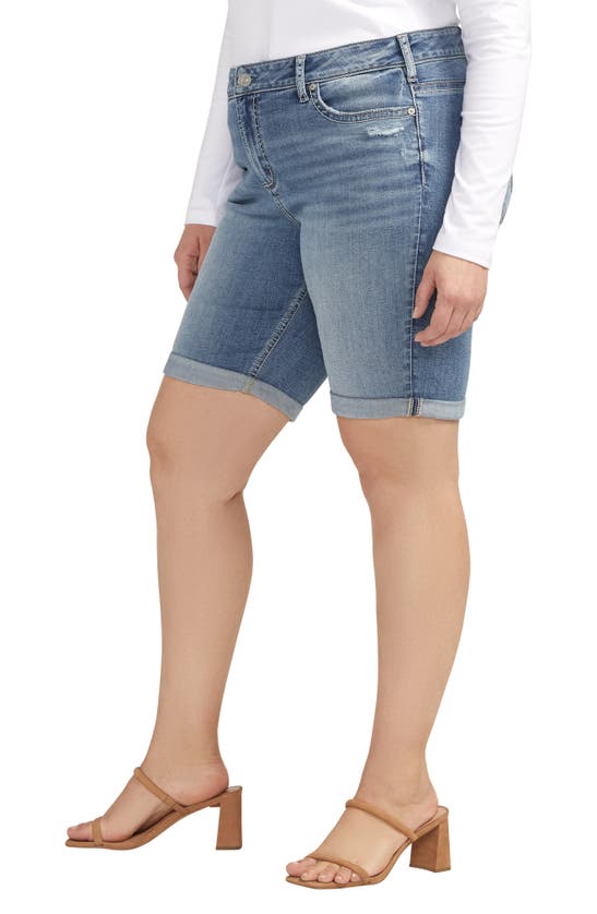 Shop Silver Jeans Co. Elyse Mid Rise Denim Bermuda Shorts In Indigo