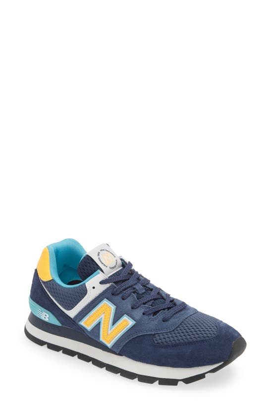 New Balance 574 Rugged Sneaker In Blue Navy/ Yellow