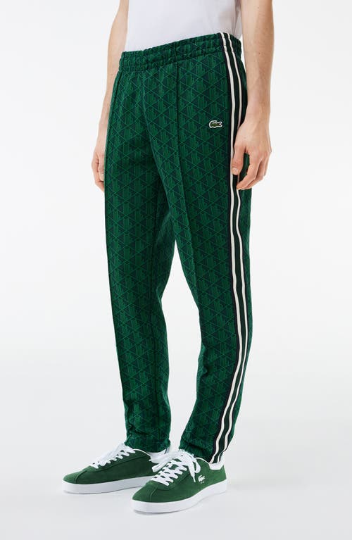 Lacoste Printed Tracksuit Pants In Marine/oseille