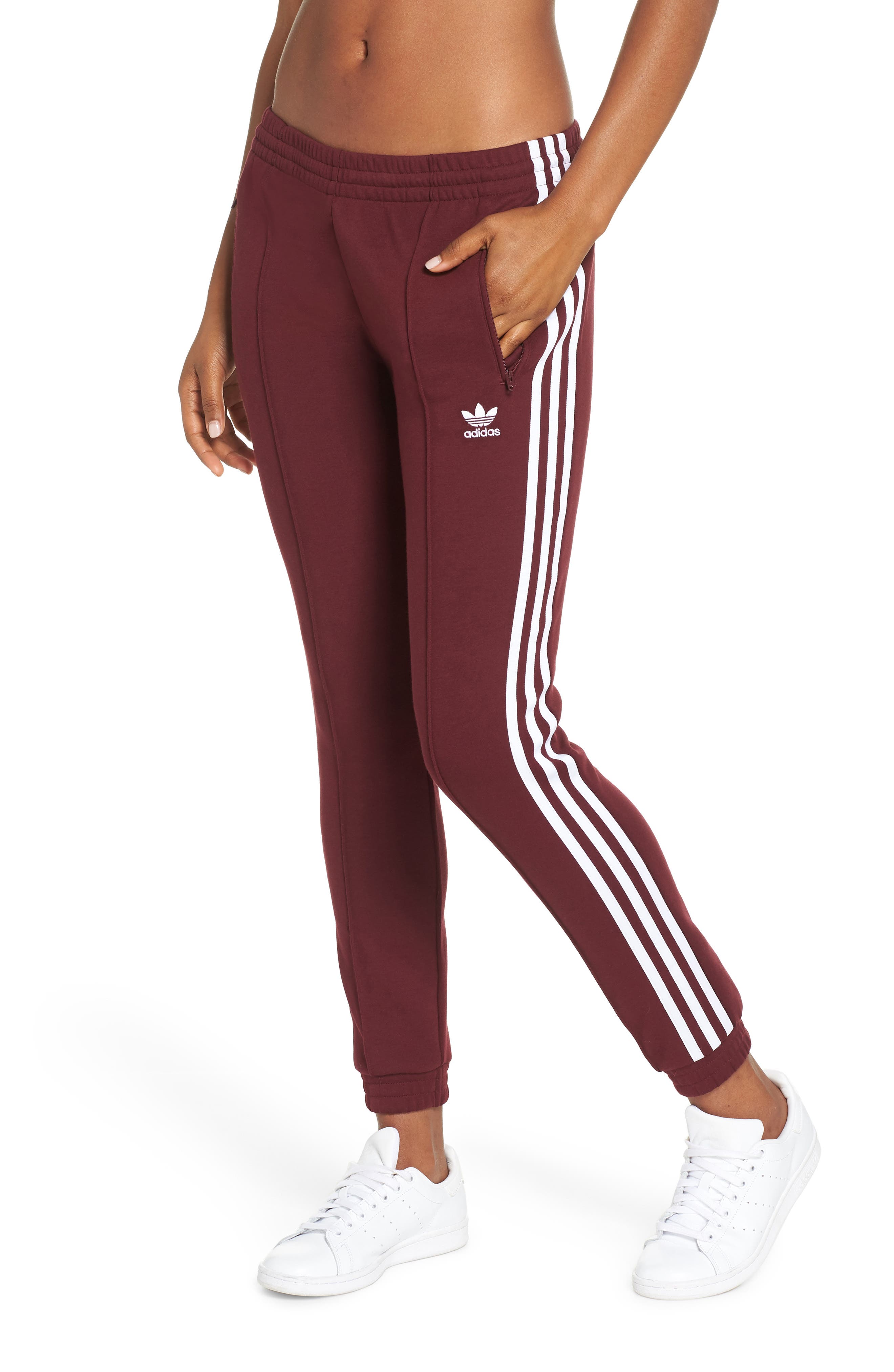 adidas sst track pants burgundy