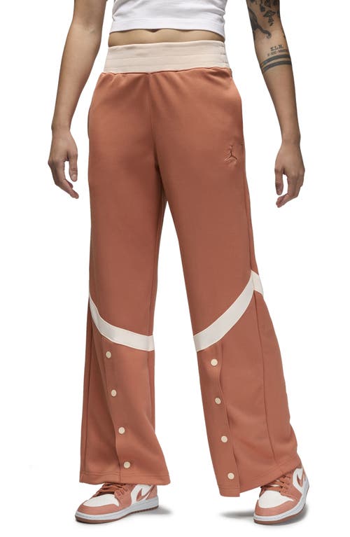 Shop Jordan (her)itage Snap Track Pants In Sky Orange/guava Ice