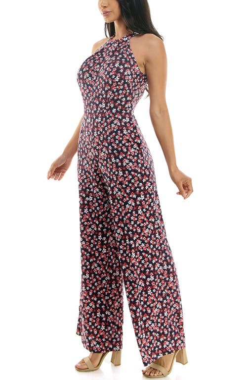 Shop Nina Leonard Twisted Halter Neck Jumpsuit In Navy/red Multi