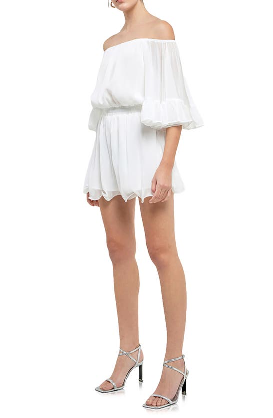 Shop Endless Rose Off The Shoulder Ruffle Sleeve Romper In White