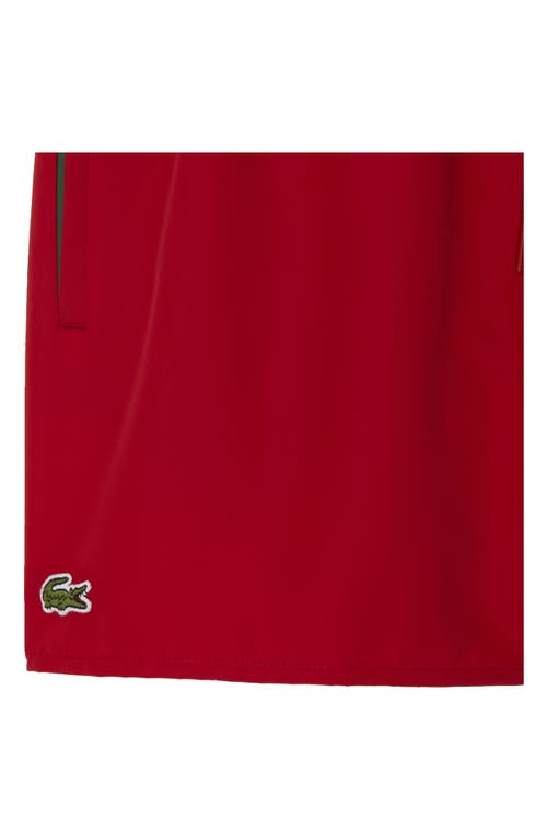 Shop Lacoste Recycled Polyester Swim Trunks In 8un Rouge/vert