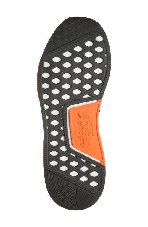 Shop Adidas Originals Adidas Nmd R1 Sneaker In Core Black/semi Impact Orange