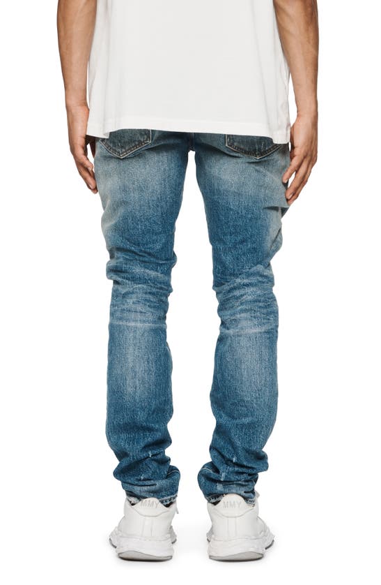 Shop Purple Brand Distressed Skinny Jeans In Mid Indigo