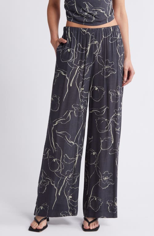 Shop Faithfull The Brand Aureli Floral Wide Leg Pants In Calla Print/charred Navy